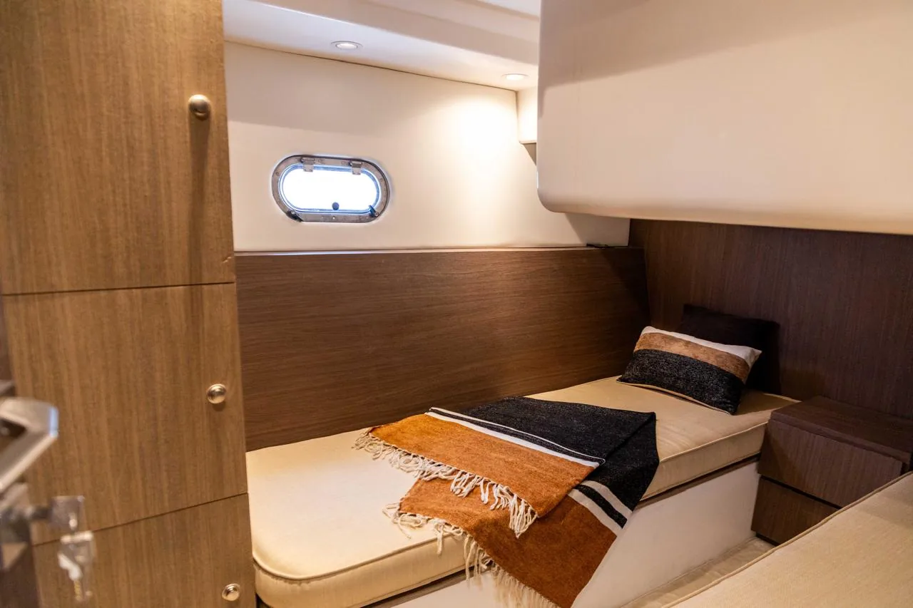 Cosy guest cabin with warm timber and soft throws